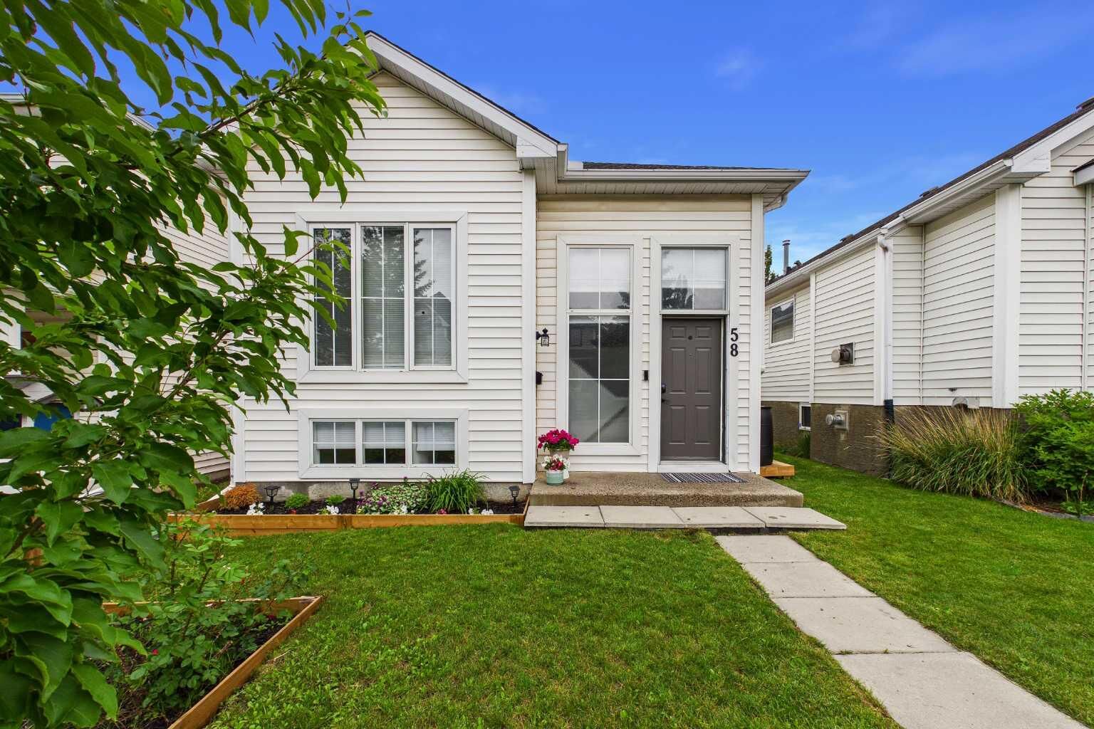 Property Photo: 58 Hidden Crescent NW AB T3A 5L4