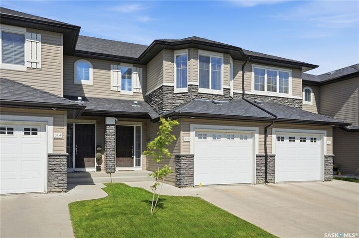 Property Photo: 410 Ledingham Way 313 SK S7V 0C4