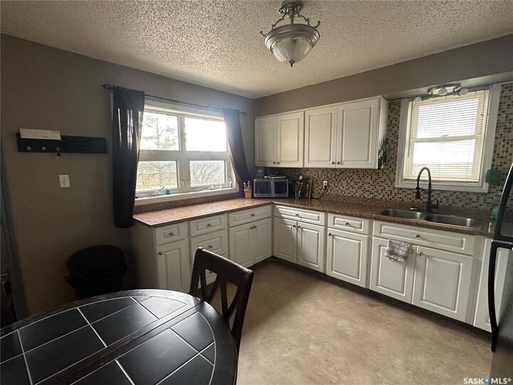 Property Photo: 102 9th Avenue SE SK S4H 1Z7