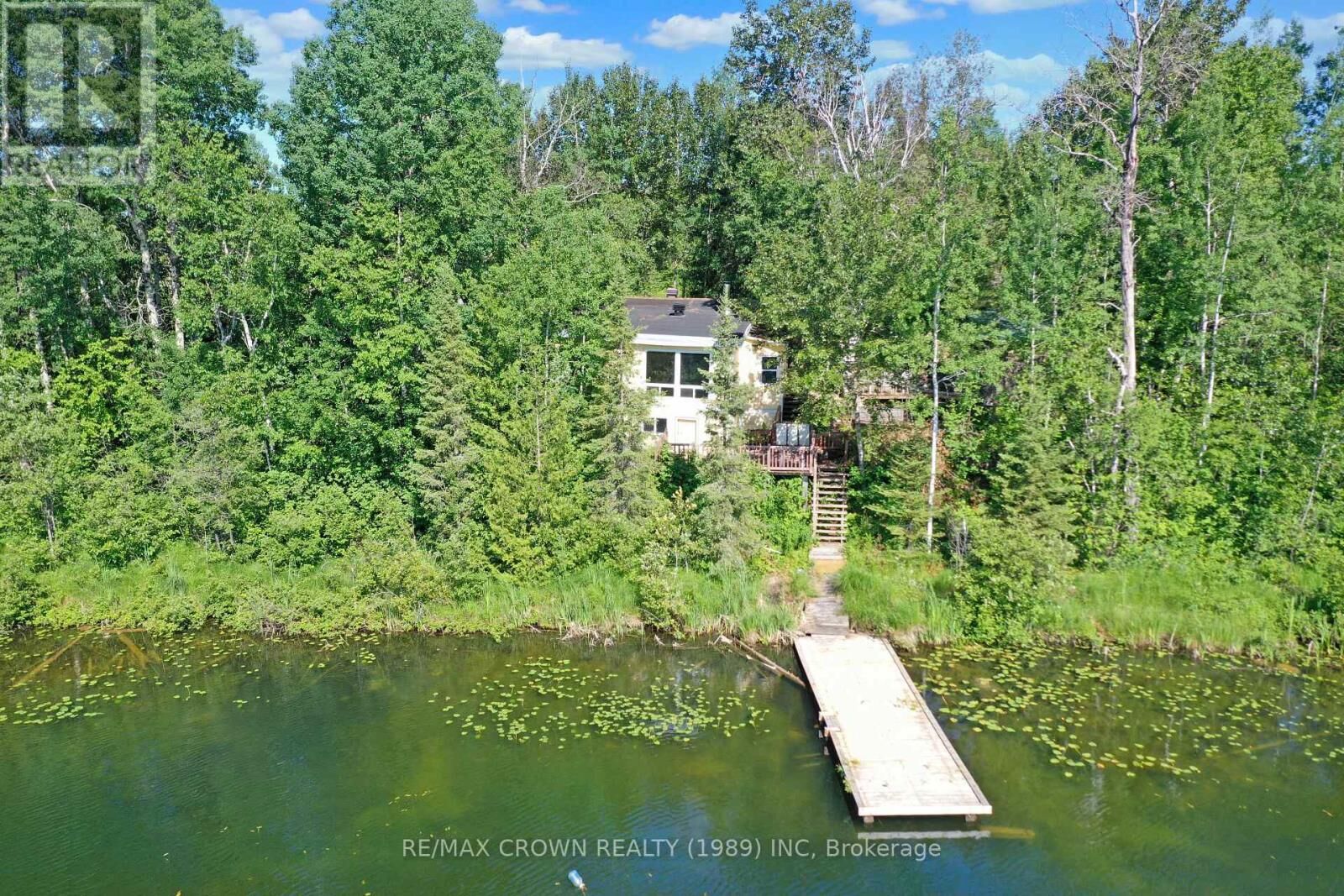 Property Photo: 22 Chain Of Lakes Road Moonbeam ON P0L 1V0