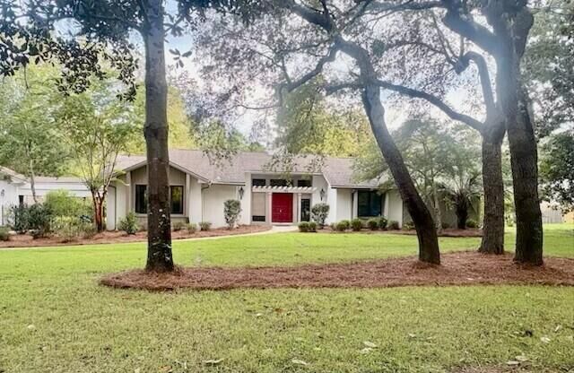 Property Photo: 103 E Capri Cove FL 32578
