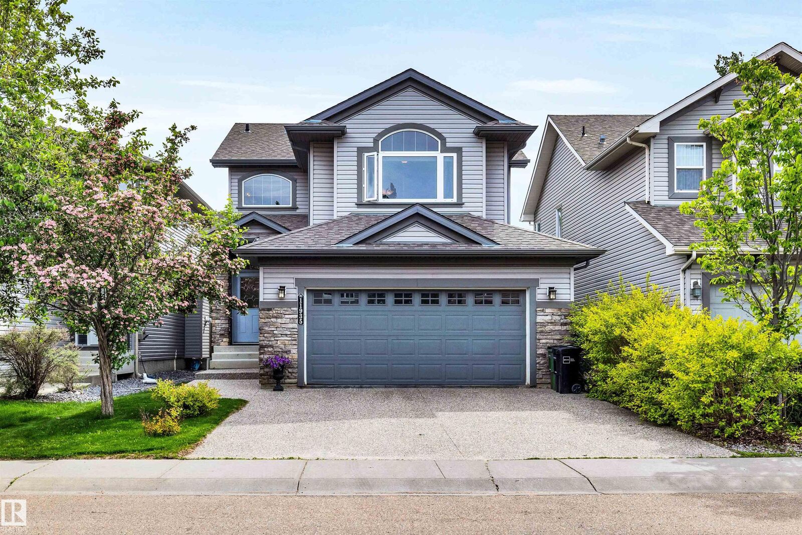 Property Photo:  11935 21 Avenue SW  AB T6W 0C8 