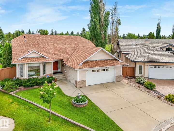 Property Photo: 11919 28 Avenue NW AB T6J 6C1