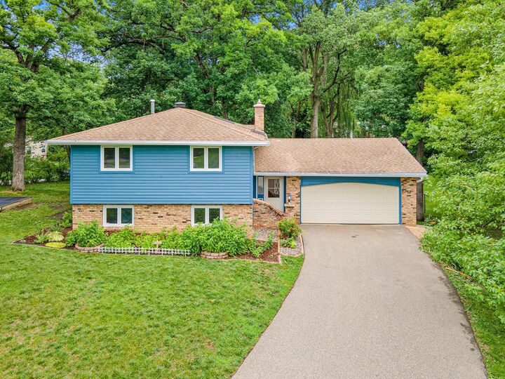 Property Photo:  5915 Hidden Oaks Circle SE  MN 55372 