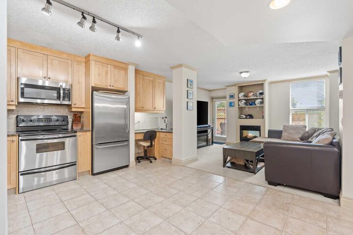 Property Photo: 4554 Valiant Drive NW 104 AB T3A 2V5