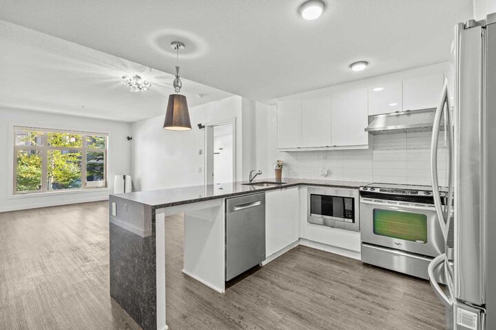 Property Photo: 25 Aspenmont Heights SW 103 AB T3H 0E4