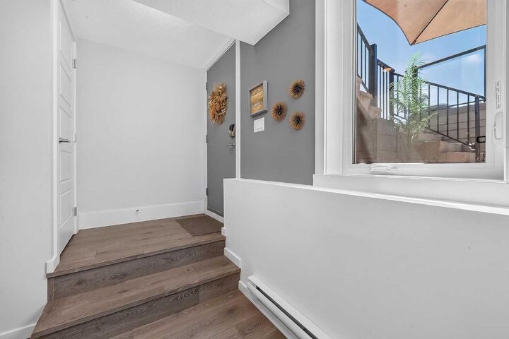 Property Photo: 19500 37 Street SE 108 AB T3M 2W9
