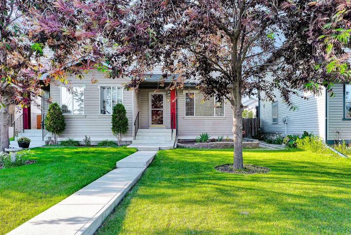 Property Photo: 203 Covemeadow Crescent AB T3K 6B1