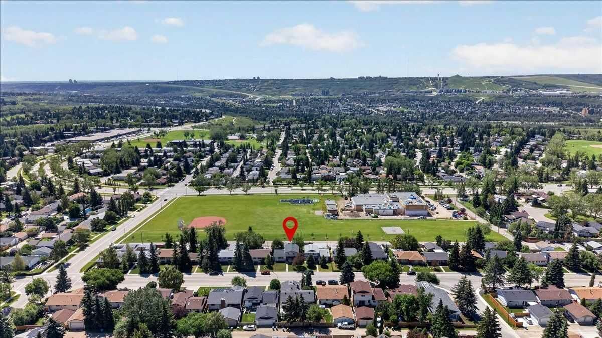 Property Photo: 7327 Silver Springs Road NW AB T3B 3X1
