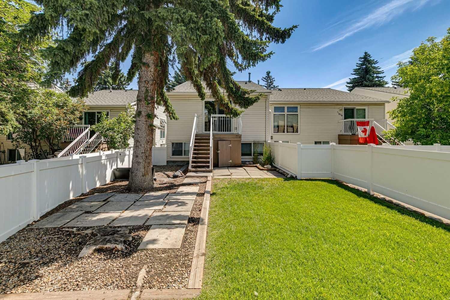 Property Photo:  11424 8 Street SW  AB T2W 4J5 