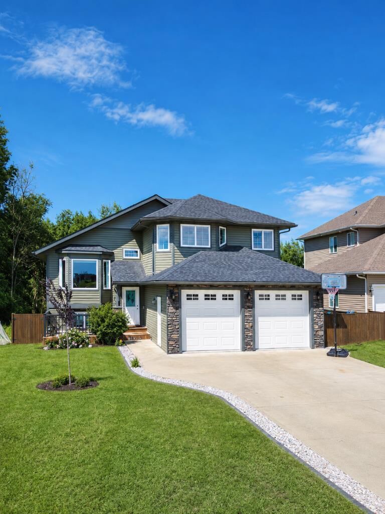 Property Photo: 42 Riverstone Road AB T7S 0E5