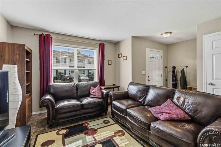 Property Photo: 203 Herold Terrace 123 SK S7V 1H7