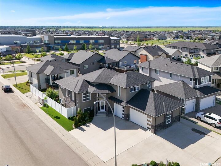 Property Photo: 202 Glacial Shores Cove SK S7W 0R7