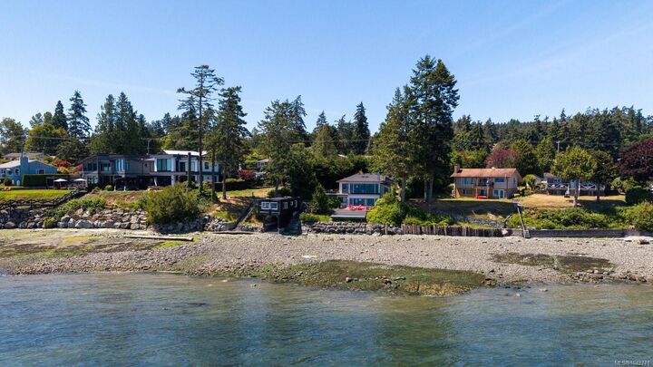 Property Photo:  8543 Lochside Dr  BC V8L 1M5 