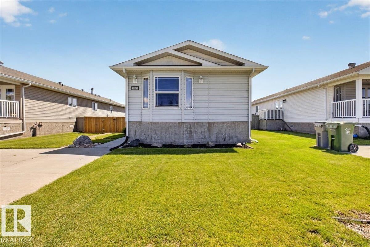 Property Photo: 1073 Aspen Drive East AB T9E 8R1