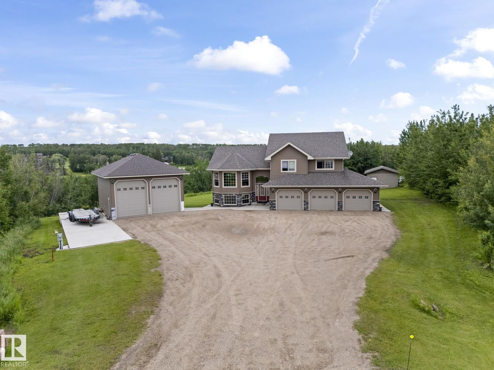 Property Photo:  61130 465 Rge Road  AB T9N 2G9 