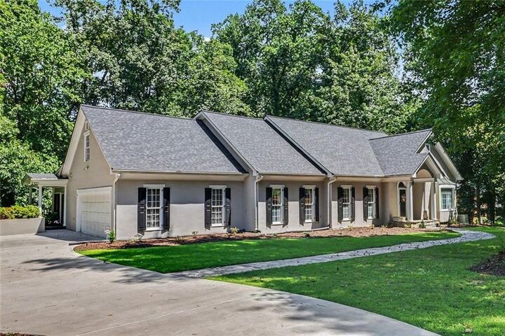 Property Photo:  3040 Spalding Drive  GA 30350 