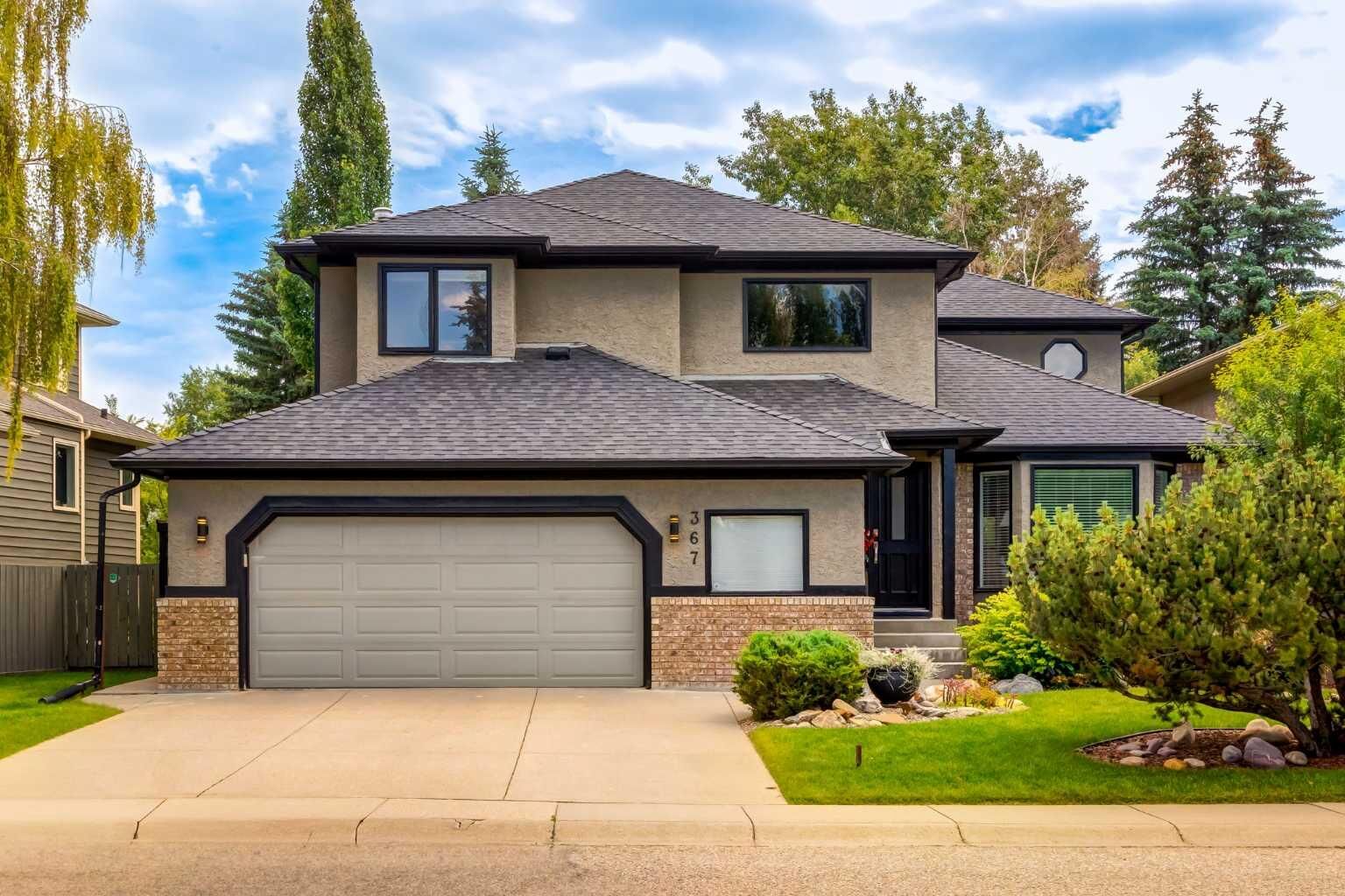 Property Photo:  367 Woodbriar Circle SW  AB T2W 6A4 