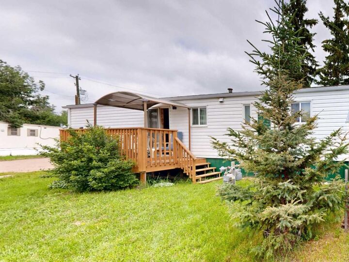 Property Photo:  4822 58 Street 12  AB T4K 1B6 