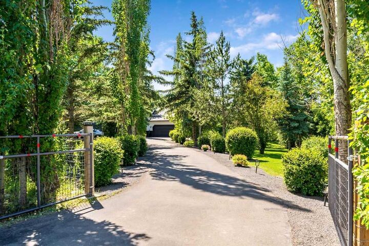 Property Photo: 80107 Highwood Meadows Drive E AB T1S 4Y9
