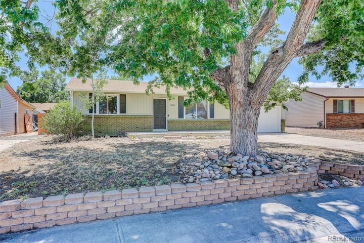 Property Photo:  15488 E Bates Avenue  CO 80013 