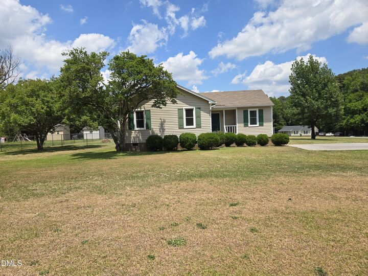 Property Photo:  221 Country Lane  NC 27520 