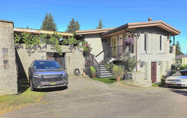 Property Photo: 19717 48A Avenue BC V3A 4W2
