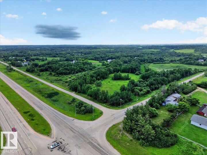 Property Photo:  51401 Hghway 60 4  AB T7Y 1C3 