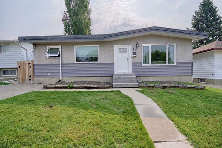 Property Photo:  32 Lemoyne Crescent W  AB T1K 4A5 