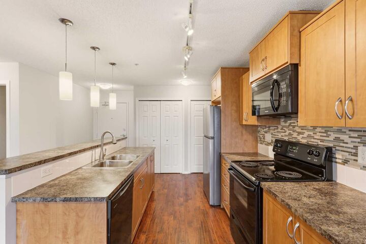 Property Photo: 700 Willowbrook Road NW 2323 AB T4B 0L5