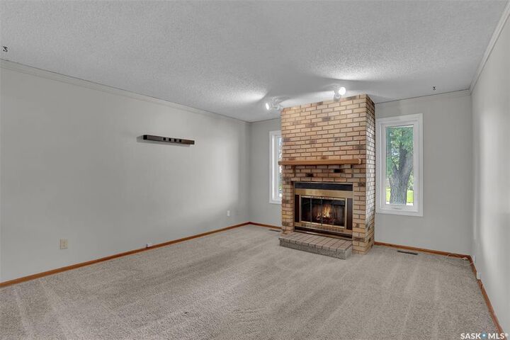 Property Photo: 1409 Rothwell Street SK S4N 2B4