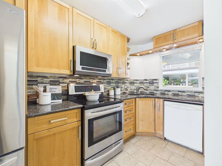 Property Photo: 2238 Kingsway Street 215 BC V5N 2T7