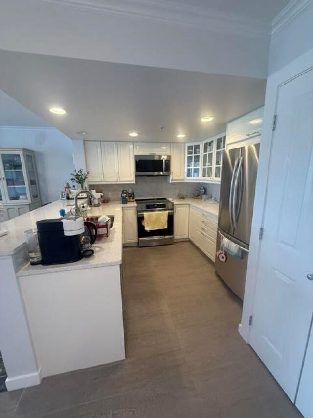 Property Photo:  295 Guildford Way 1807  BC V3H 5N3 