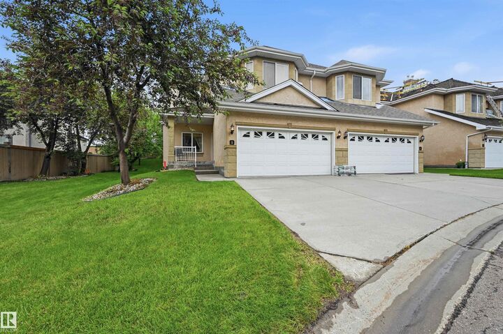 Property Photo: 577 Butterworth Way NW 1 AB T6R 2Y2