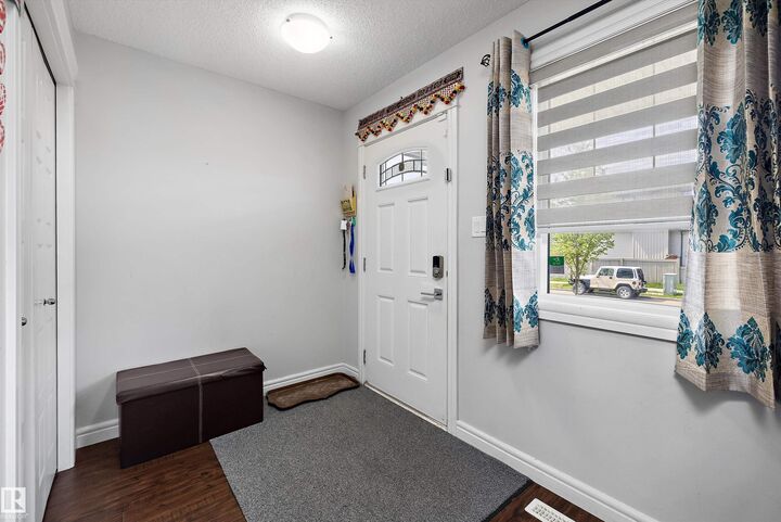 Property Photo: 1563 Tamarack Boulevard NW AB T6T 2E2