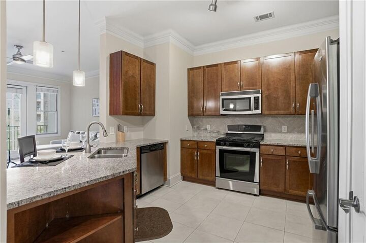 Property Photo: 3621 Vinings Slope SE 2425 GA 30339