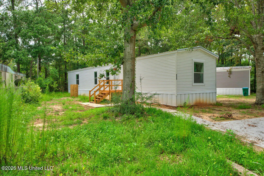 Property Photo:  7729 Narcissus Drive  MS 39553 