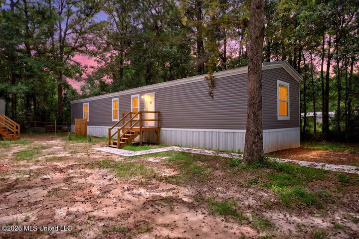 Property Photo:  7737 Narcissus Drive  MS 39553 
