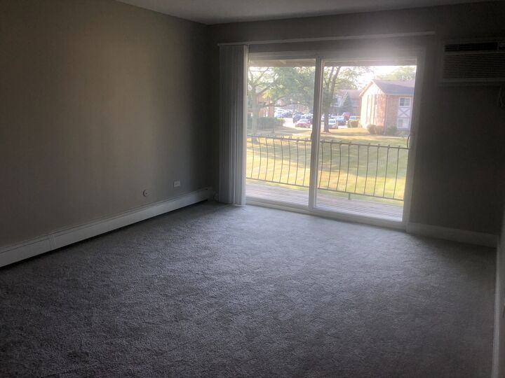 Property Photo:  16W535 79th Street 203  IL 60527 