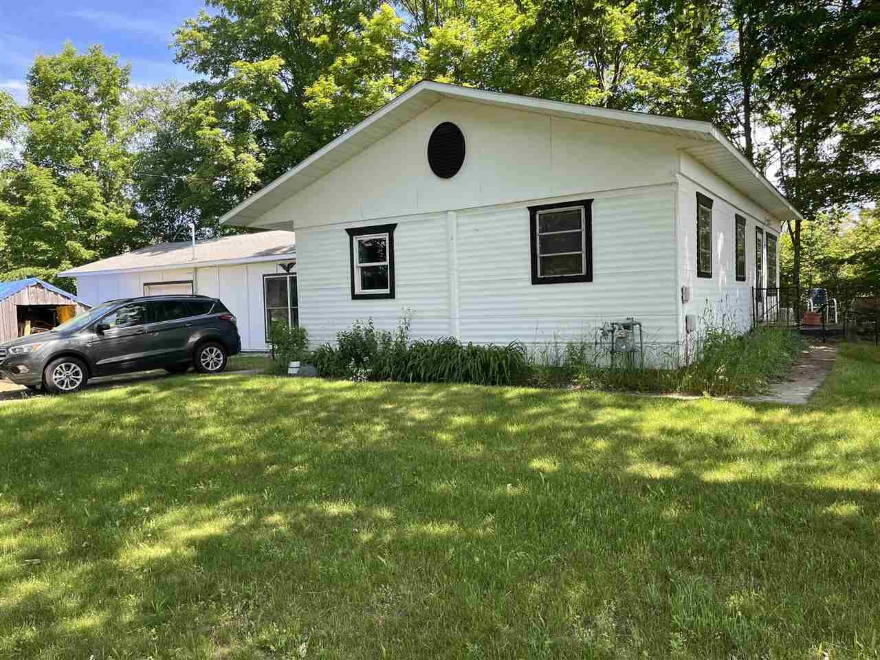 Property Photo: 05940 N M-66 MI 49720