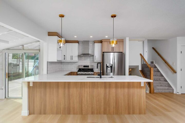 Property Photo: 312 Queensland Road SE AB T2J 3S6