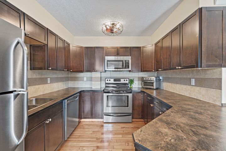 Property Photo: 50 8 Avenue 8 AB T1V 1E8