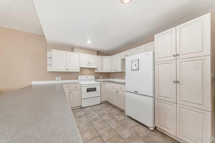 Property Photo:  1922 9 Avenue SE 6  AB T2G 0V2 