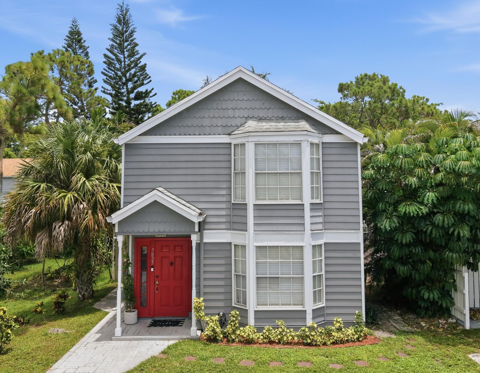 Property Photo: 5825 Dewberry Way FL 33415
