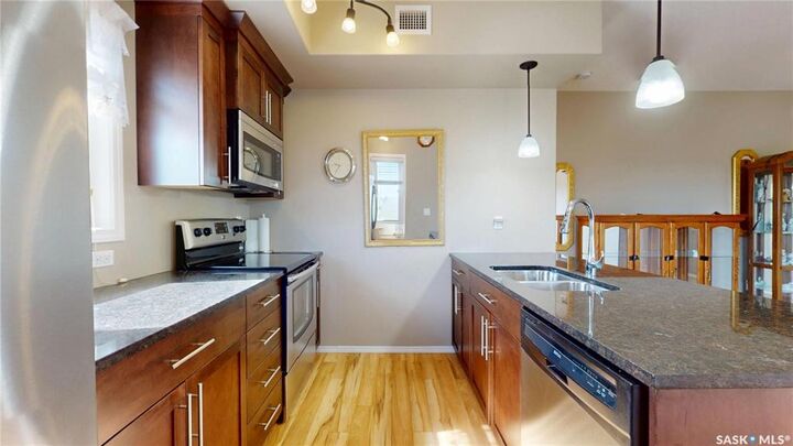Property Photo: 1220 Blackfoot Drive 415 SK S4S 6T2