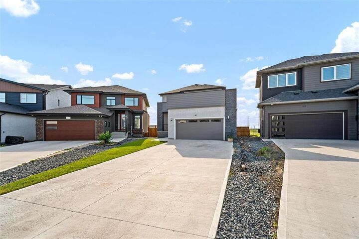 Property Photo: 46 Dumontet Crescent MB R3X 0P4