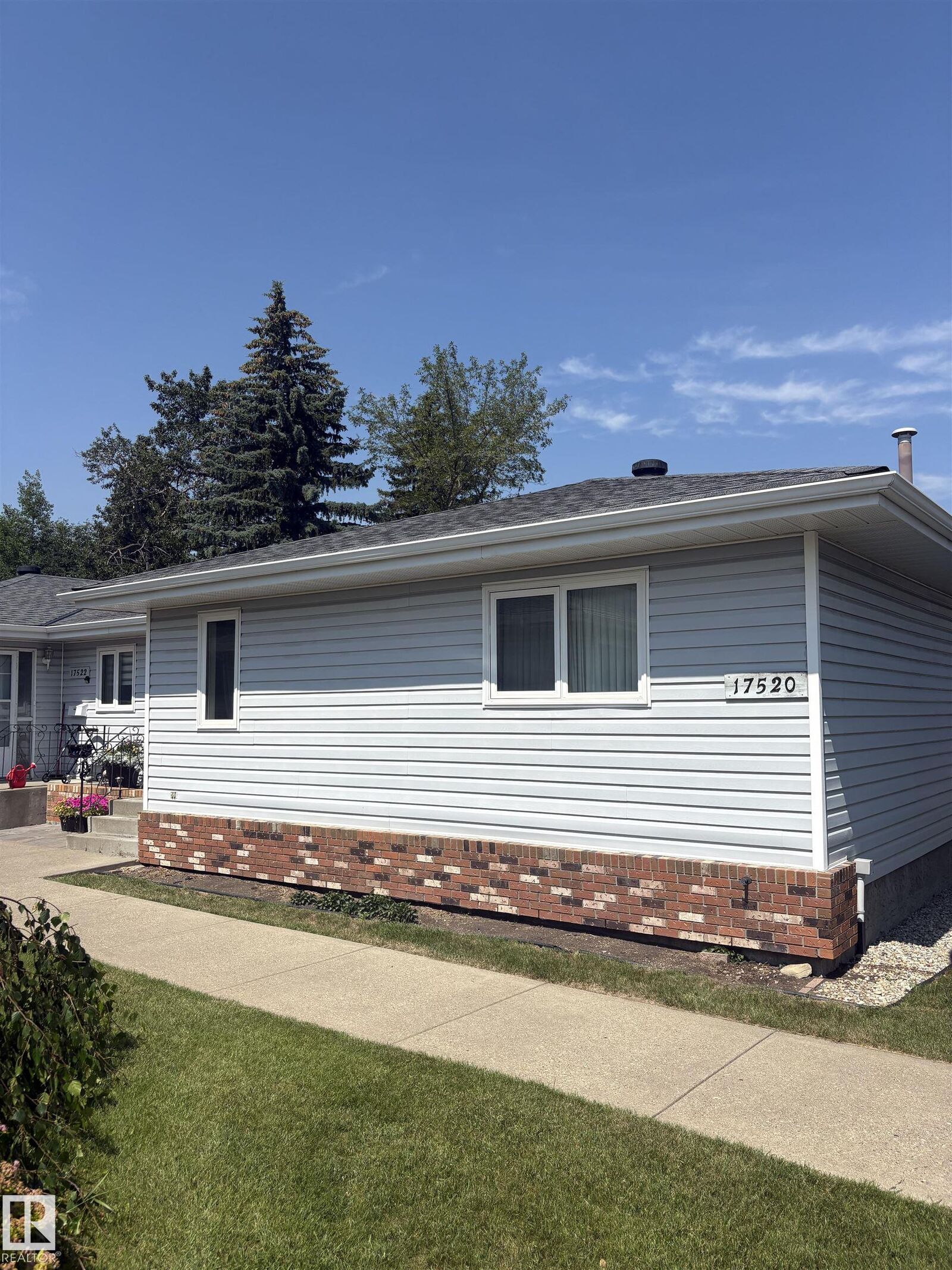 Property Photo: 17520 Callingwood Road NW AB T5T 5P1