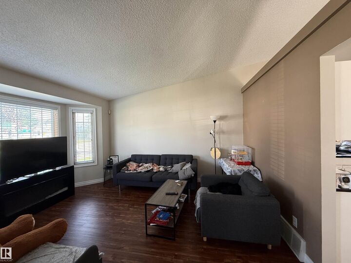 Property Photo:  8025 15A Avenue NW  AB T6K 4E2 