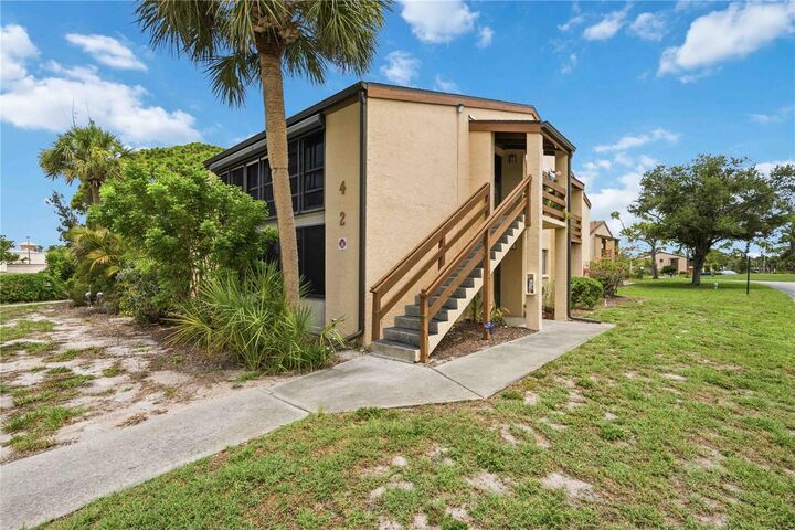 Property Photo:  18 Quails Run Boulevard 18202  FL 34223 