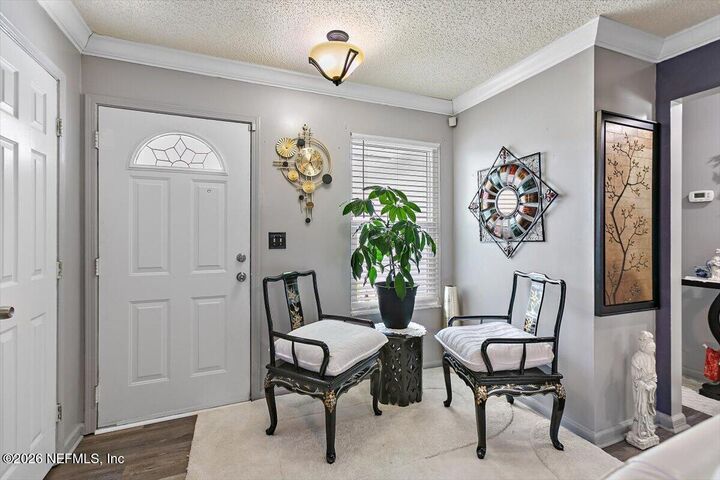 Property Photo:  8439 Collins Road  FL 32244 